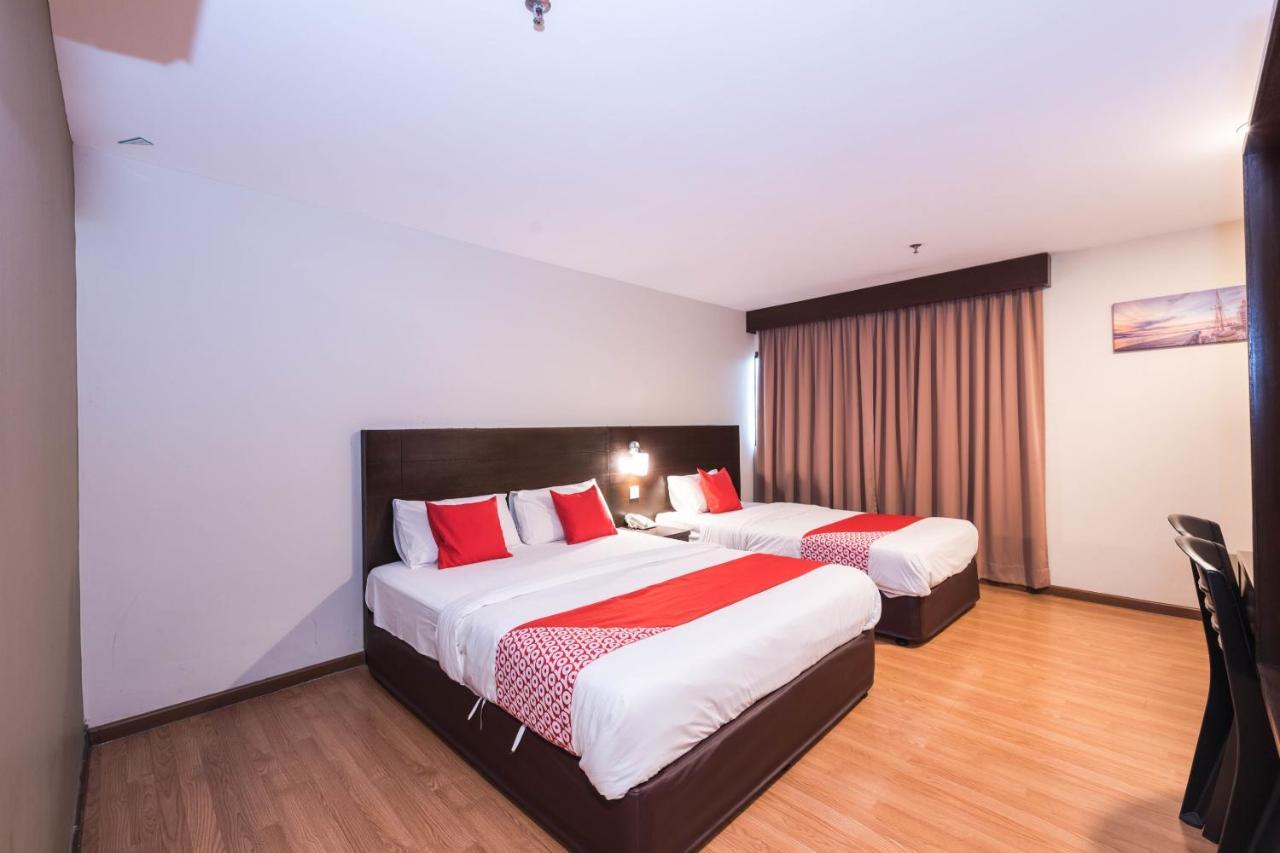 Oyo 89421 Pp Island Hotel Джорджтаун Экстерьер фото