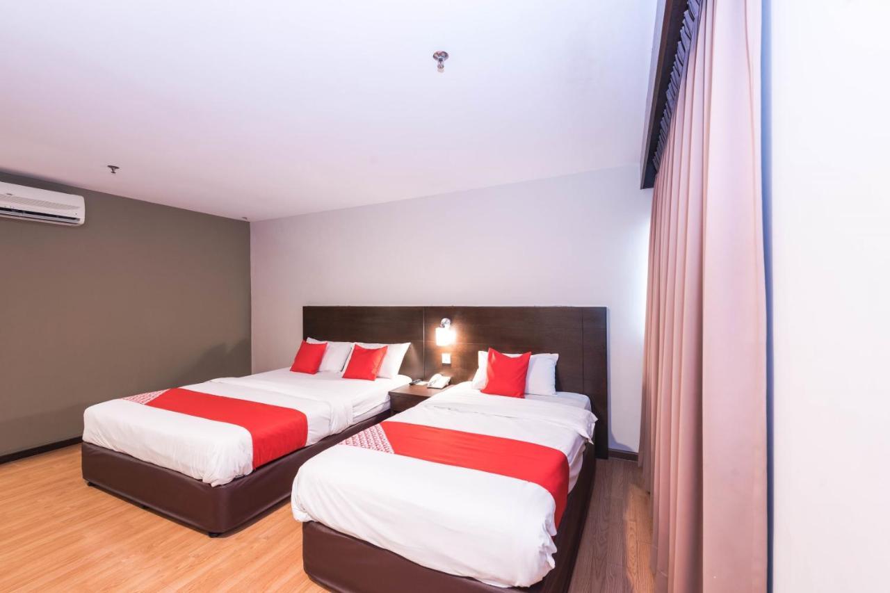 Oyo 89421 Pp Island Hotel Джорджтаун Экстерьер фото